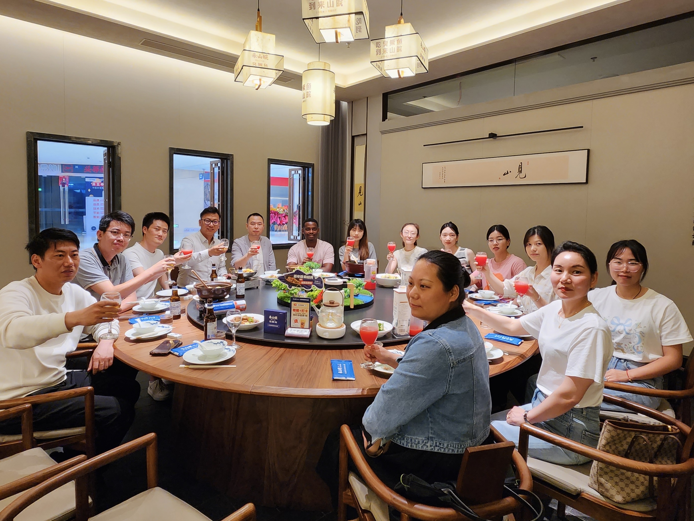 The company organizes a gathering for all employees